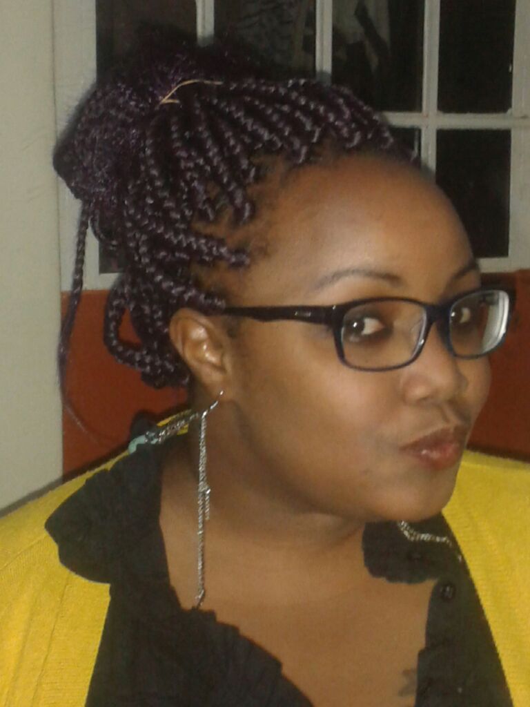 Freddie Ngunju SEO and AI search expert and digital marketing coach and director while she was still young in 2012 teaching herself digital marketing